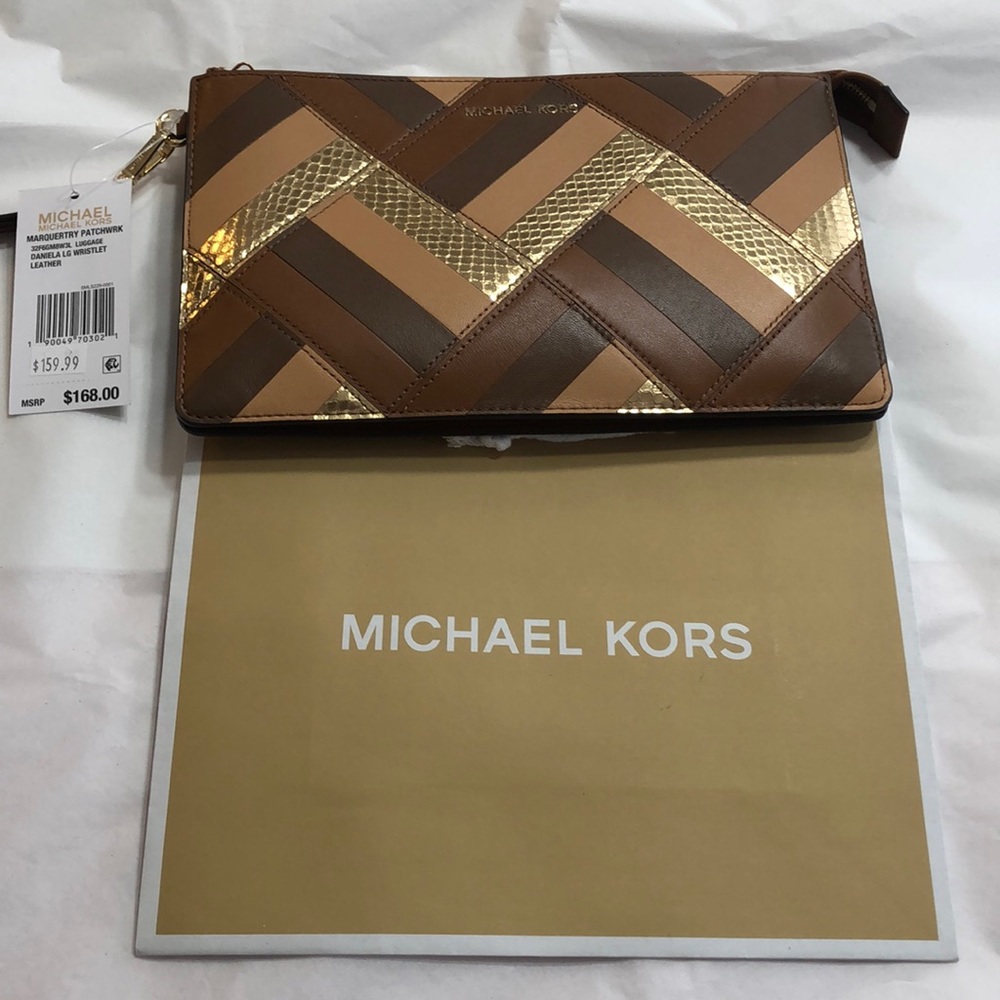 Brand new Micheal Kors wristlet/clutch